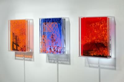 Helen Brough, painted and fired glass works with lights.