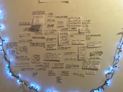 Wall of written notes with string lights, 25 July 2016.