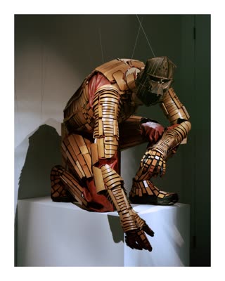 Atixipman: a life-size, fully articulated suit of bamboo, oak and maple on a leather skin, 2007.