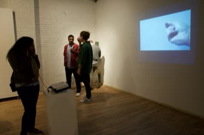 Visitors by a projection, 30 April 2016.