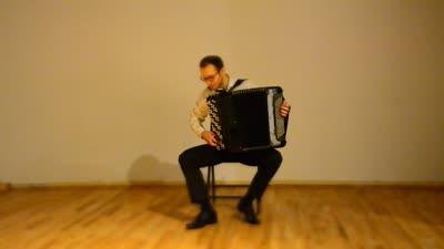 Ivan Filipchyk playing the accordion, 23 December 2015.