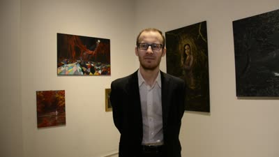 Ivan Filipchyk with his paintings, 23 December 2015.