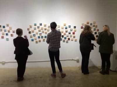 Visitors at the paintings, 10 April 2016.