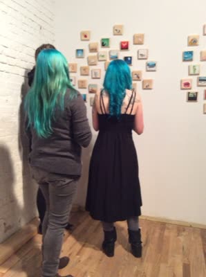 Visitors at the paintings, 10 April 2016.