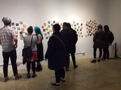 Visitors at the paintings, 10 April 2016.