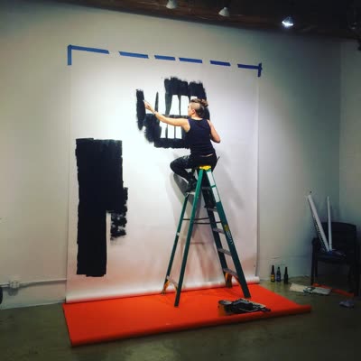 Gilf! painting the mural for the screening, 20 November 2015.