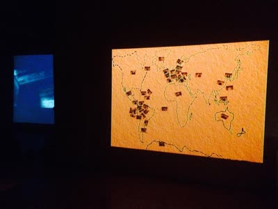The installation on the night: a world map wall and the projection, 21 November 2015.