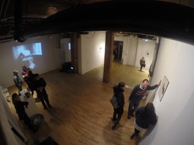 Overhead view: visitors at the smoke drawings, with Empty Chair projected, 30 January 2016.