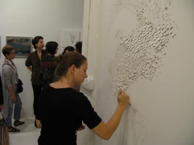 Opening reception, Caroline McAuliffe's wall carving Set In in progress, 25 September 2009.