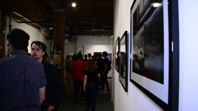 Framed photographs along the wall, INTIMACY, 22 August 2015.