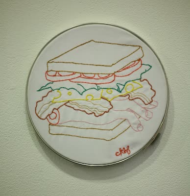 Cassady Fernandez, Hand Sandwich, embroidery, 2009, in the gallery, 7 May 2009. Photo: Justin William Lin.
