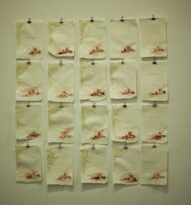 Kate Hill Cantrill, a writing piece with pen and ink on 20 sheets of paper, in the gallery, 7 May 2009. Photo: Justin William Lin.