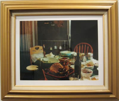 Framed photograph of a dinner table.