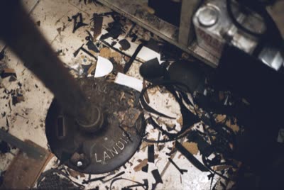 Lindsay Blatt, from Repair & Shine: machine base and leather scraps, 2008, large-format photograph.