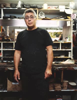Lindsay Blatt, from Repair & Shine: shoe repairman in his shop, 2008, large-format photograph.