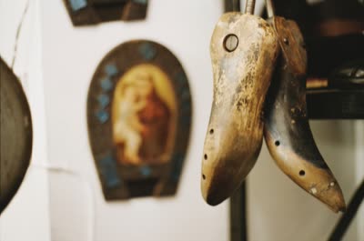 Lindsay Blatt, from Repair & Shine: shoe lasts and a devotional image, 2008, large-format photograph.