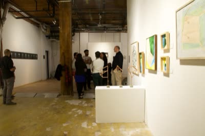 Gallery view with plinths and paintings, 7 April 2016.