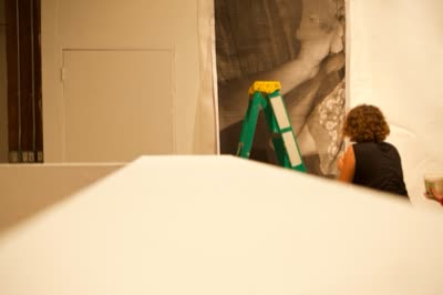 Live painting on a large photographic portrait, early in the evening, 4 October 2015.
