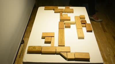 Wooden blocks laid out on a white plinth, 20 April 2016.