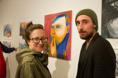 Visitors by a painting, 26 April 2016.