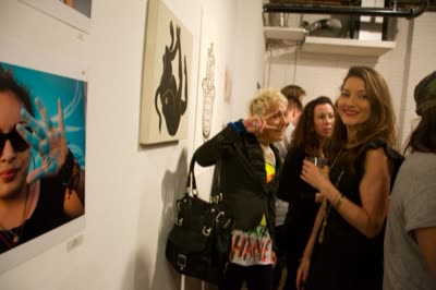 Visitors by the photographs, 26 April 2016.