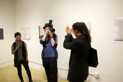 Visitors photographing the show, 1 April 2016.