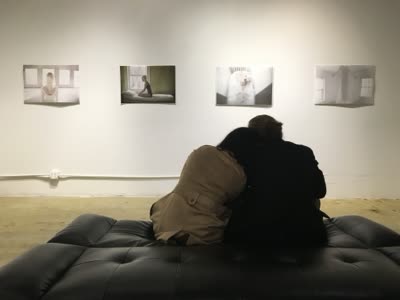 Visitors with photographs by Svetlana Jovanovic, 1 April 2016.