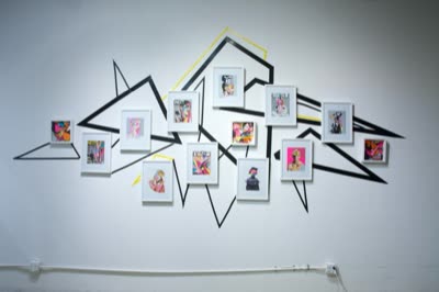 Collages by Lauro Samblás in a taped wall installation, 10 February 2016.